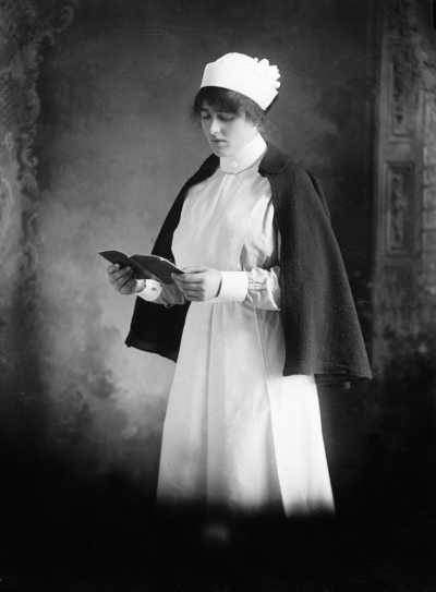 Studio portrait of a woman in a nurse&rsquo;s uniform.  Family name &lsquo;Cunningham&rsquo;.
