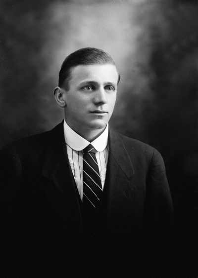 Studio portrait of Mr. Jennings wearing a suit.