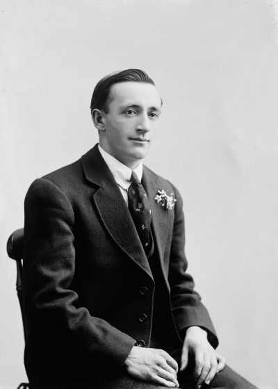 Studio portrait of a young man.  Family name Buckland.