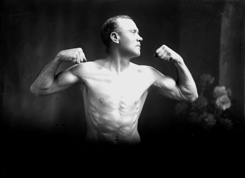 An unidentified man demonstrating a callisthenic pose.