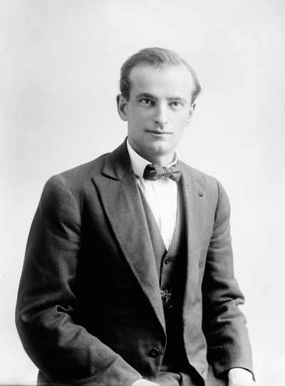 Studio portrait of a young man wearing a bow tie.  Family name possibly Ludwig.