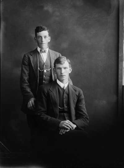 Studio portrait of two young men.  Family name possibly Tanner.