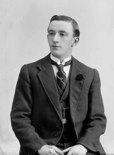 Studio portrait of a young man.  Family name Buckland.