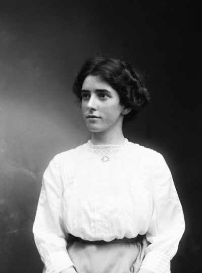 Studio half-length portrait of a woman. Name possibly E. Drummond.