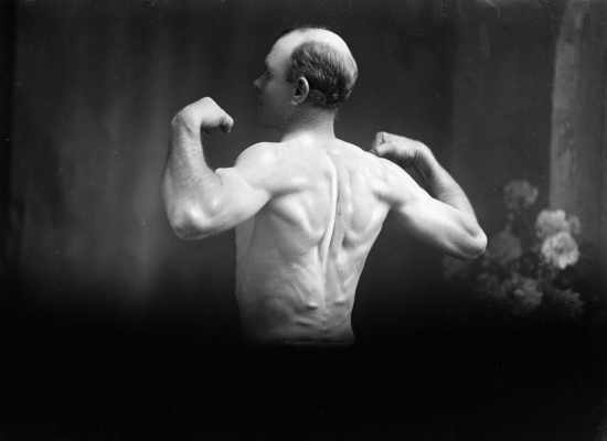 An unidentified man demonstrating a callisthenic pose.