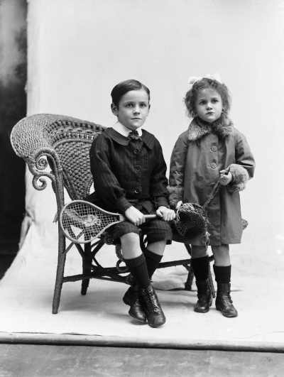 Studio portrait of two children.  Family name Oliver.