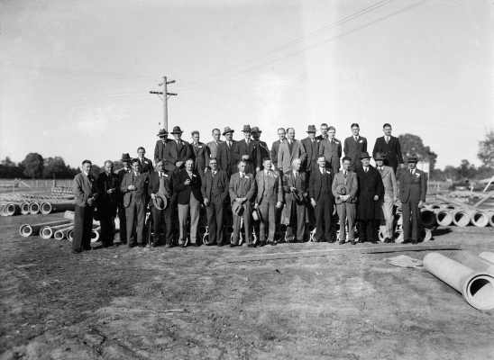 A group of men at the Hume Pipe Co. plant in Benalla.
