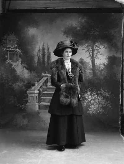 Studio full-length portrait of Miss Rawson.