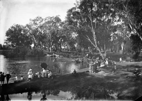People gathered along the banks of a river, possibly at Benalla.