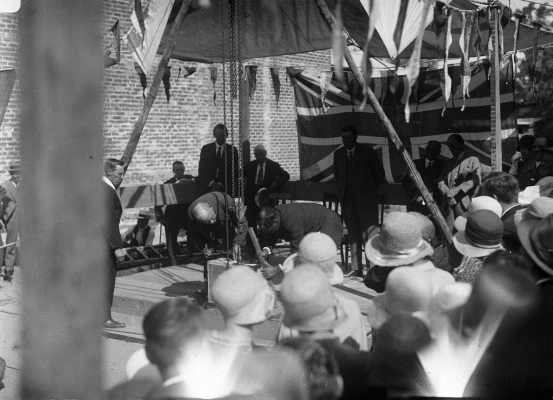 Laying a foundation stone for an unknown building.