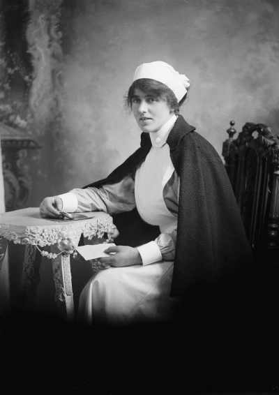 Studio portrait of a woman in a nurse&rsquo;s uniform.  Family name &lsquo;Cunningham&rsquo;.