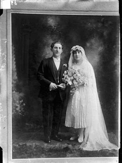 A wedding couple in a studio.