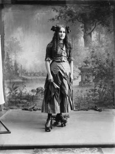 Portrait of Miss Murphy wearing roller skates.