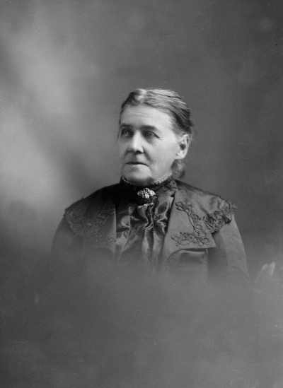 Studio portrait of  Mrs. Wallace.