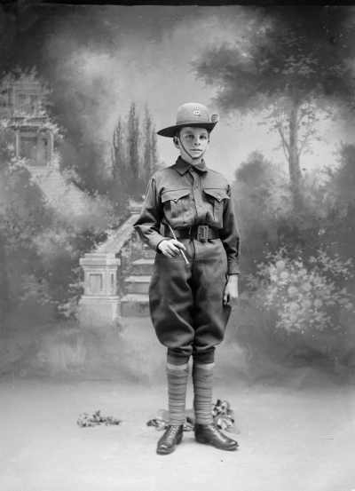 Studio portrait of a young man, family name Cuffe, in a cadet army uniform.