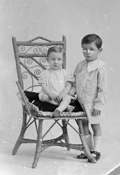 Studio portrait of  two young boys.   Family name Wiltshire.