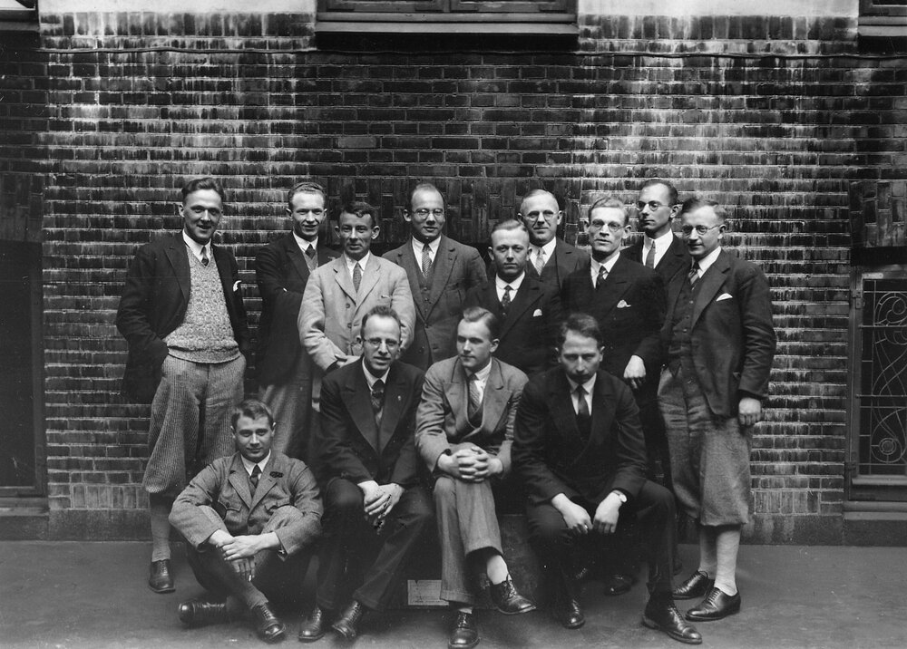 Large group of people outside an unidentified building
