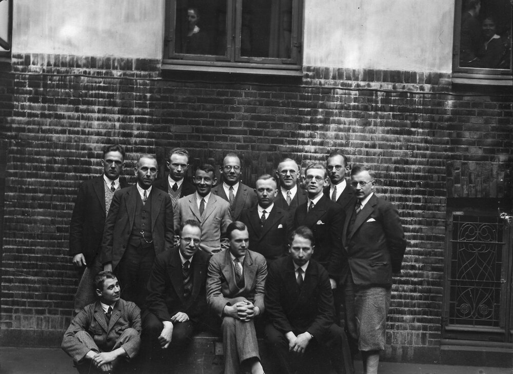 Large group of people outside an unidentified building
