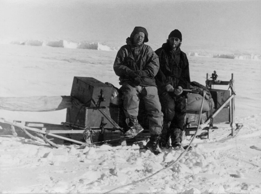 Loewe and other sitting on sled