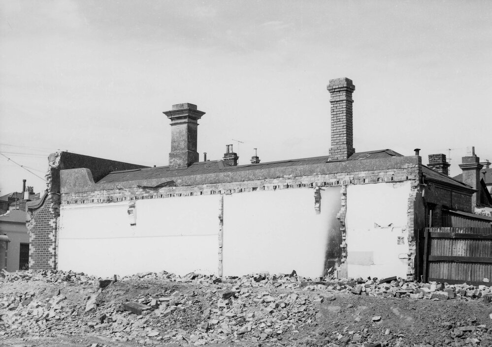 House and demolition sites in Condell Street, Fitzroy, Melbourne.