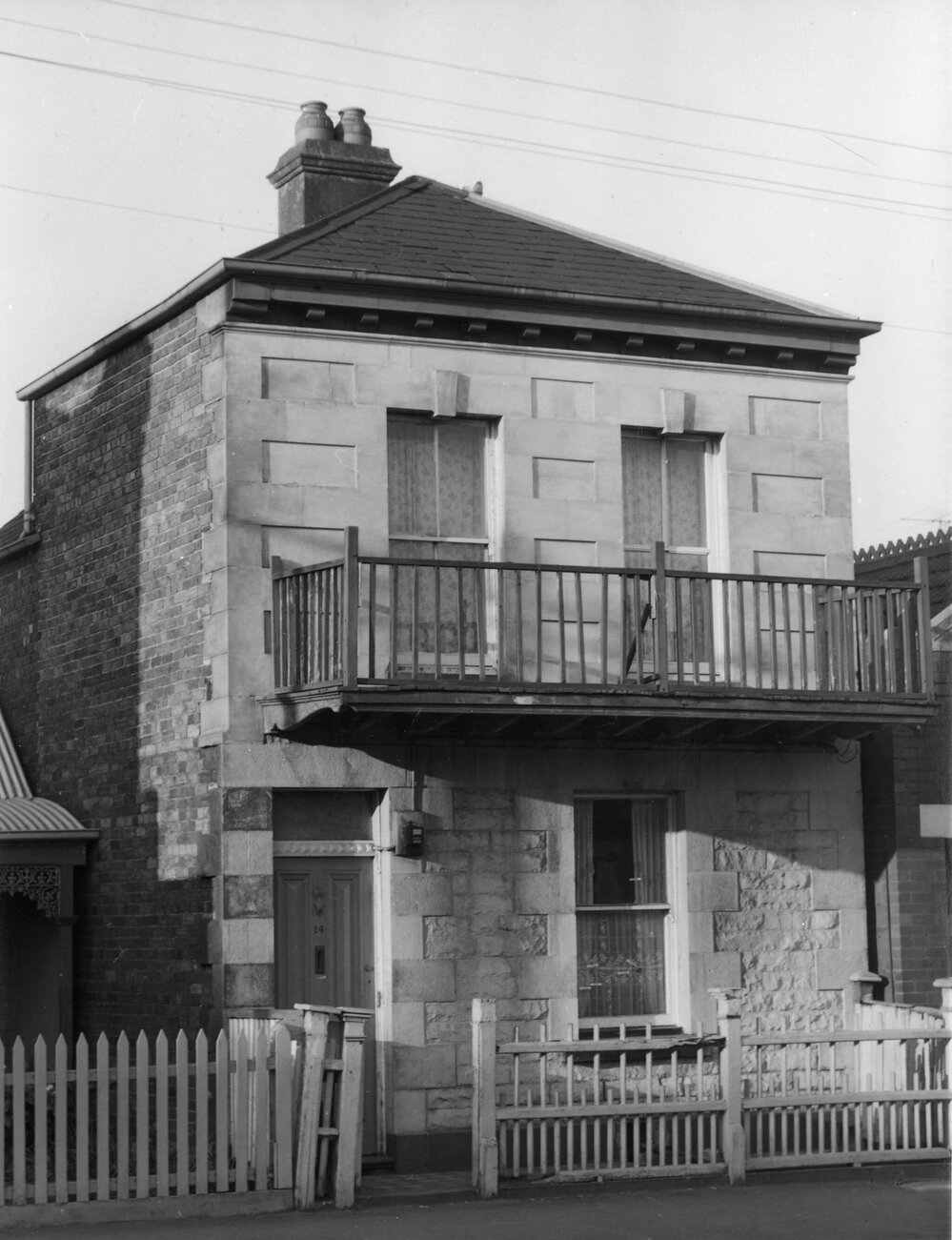 A two storey dwelling in Murchison Street, Carlton, Victoria.