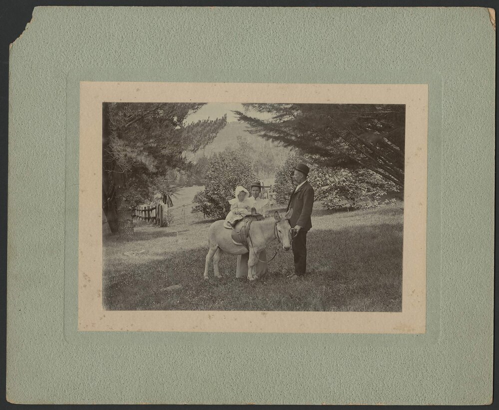 James Smith Reid with wife Martha, Mollie on a donkey
