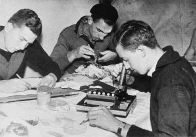 Preparing and examining specimens.