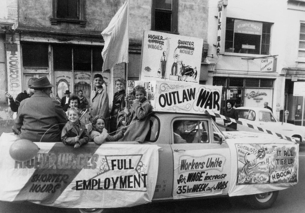 A  float promoting "higher wages, shorter hours and outlaw war" in Melbourne.