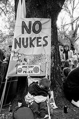 "No nukes" banner at May Day rally, 1991.