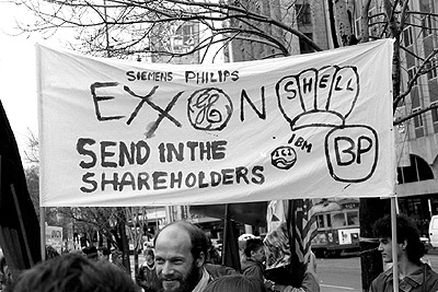 "Exxon, Shell - send in the shareholders" banner at the Gulf Crisis rally in the City Square, 25th August 1990.