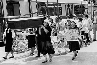 Coffin at El Salvador march to U.S. consulate offices, November 1990.