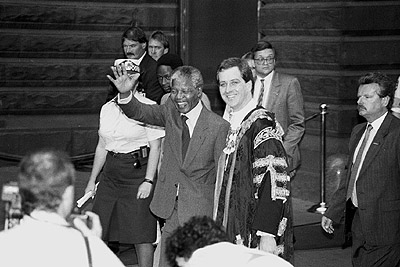 Nelson Mandela greeted by crowd outside Melbourne Town Hall, 25th October 1990.