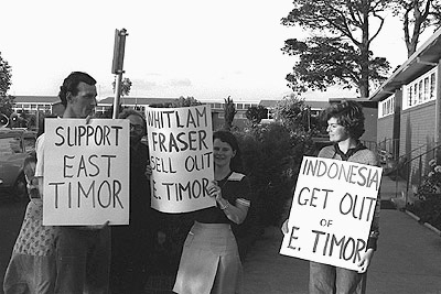East Timorese supporters with placards, 1975.