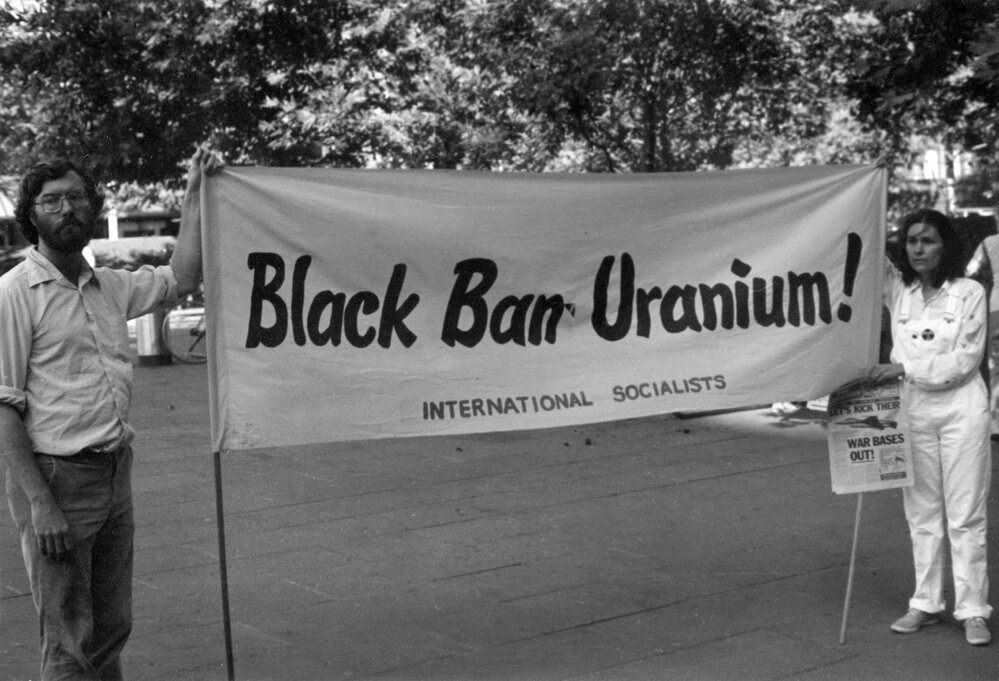 Nuclear-Free Pacific demonstration - "Black Ban Uranium" banner.
