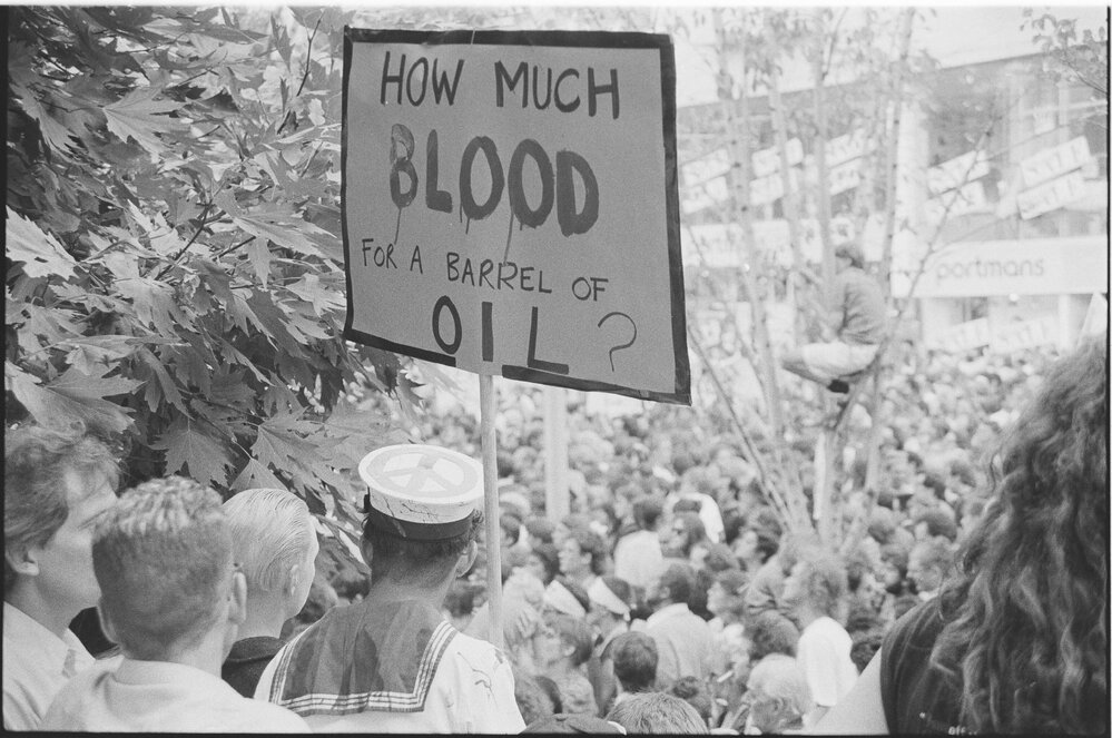 "How much blood for a barrel of oil" poster at second Persian Gulf war protest march, 25 January 1991.