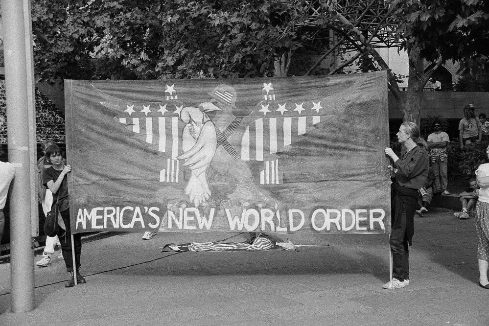 "America's new world order" banner at the second Persian Gulf war protest march, 25 January 1991.