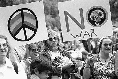 Posters at the People for Nuclear Disarmament Palm Sunday Rally, April 1990.