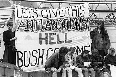 "Let's give this anti-abortionist hell" banner during U.S. President George Bush's visit to Melbourne, 2 January 1992.
