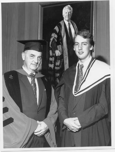 Dr. Robin Sharwood, (left), Faculty of Law, with his godson, John Daley.