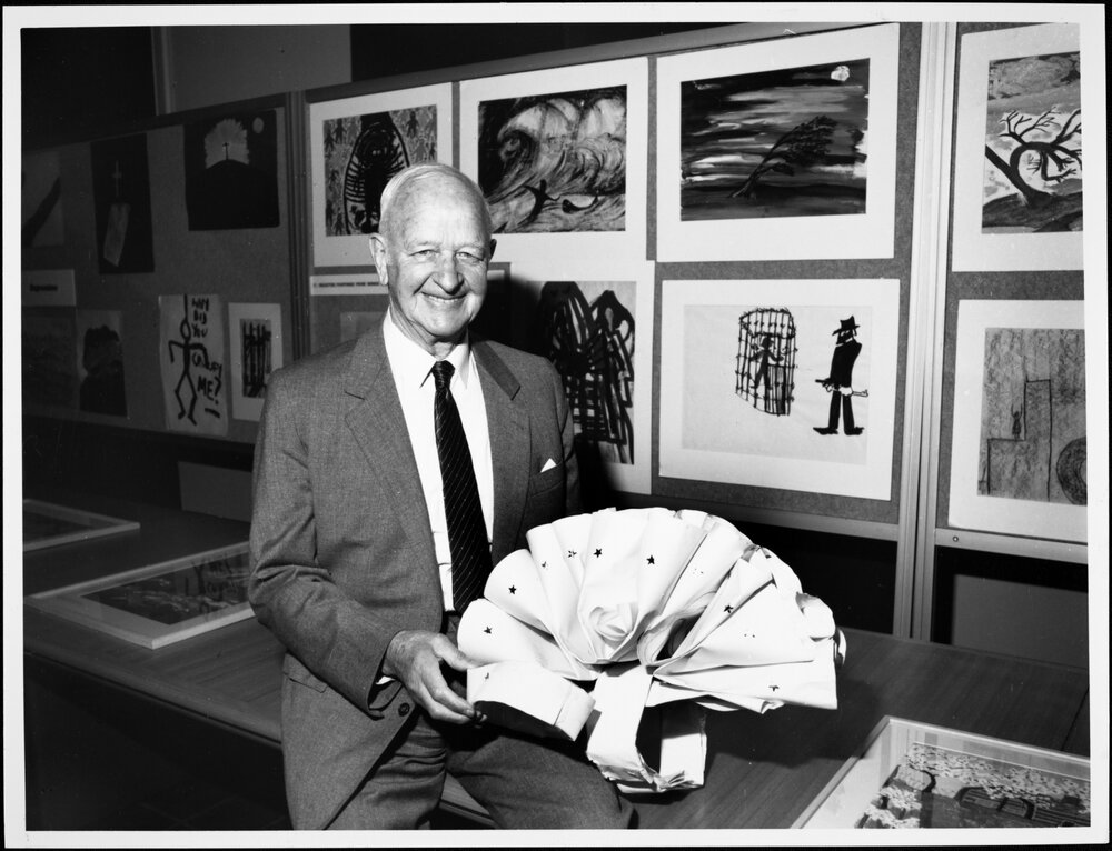 Dax, Dr Eric Cunningham, with one of the works from the Psychiatric Art Collection, Horsham Regional Art Gallery.