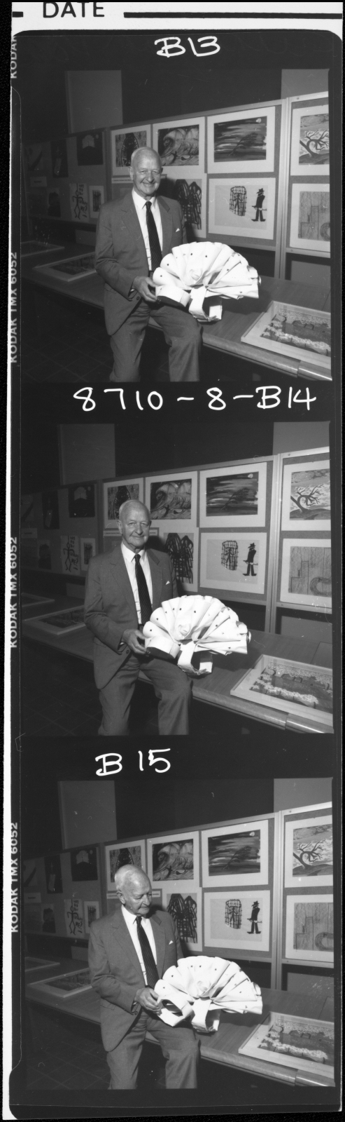 Dax, Dr Eric Cunningham, with one of the works from the Psychiatric Art Collection, Horsham Regional Art Gallery.