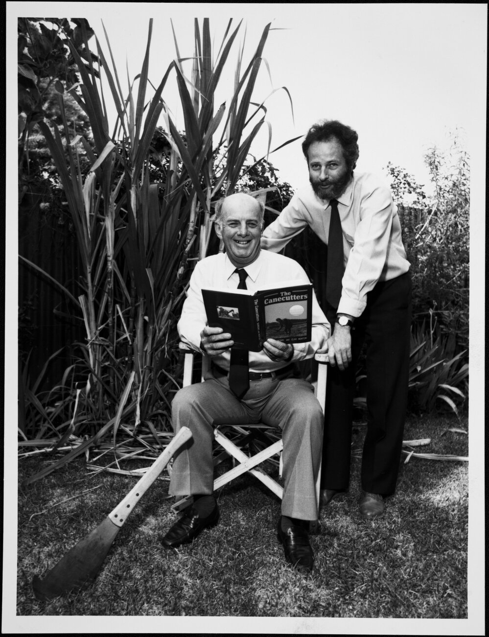 Burrows, Geoff (right), Chairman of Department of Accounting and Business Law, with his co-author of &nbsp;&lsquo;The Canecutters&rsquo; Clive Morton