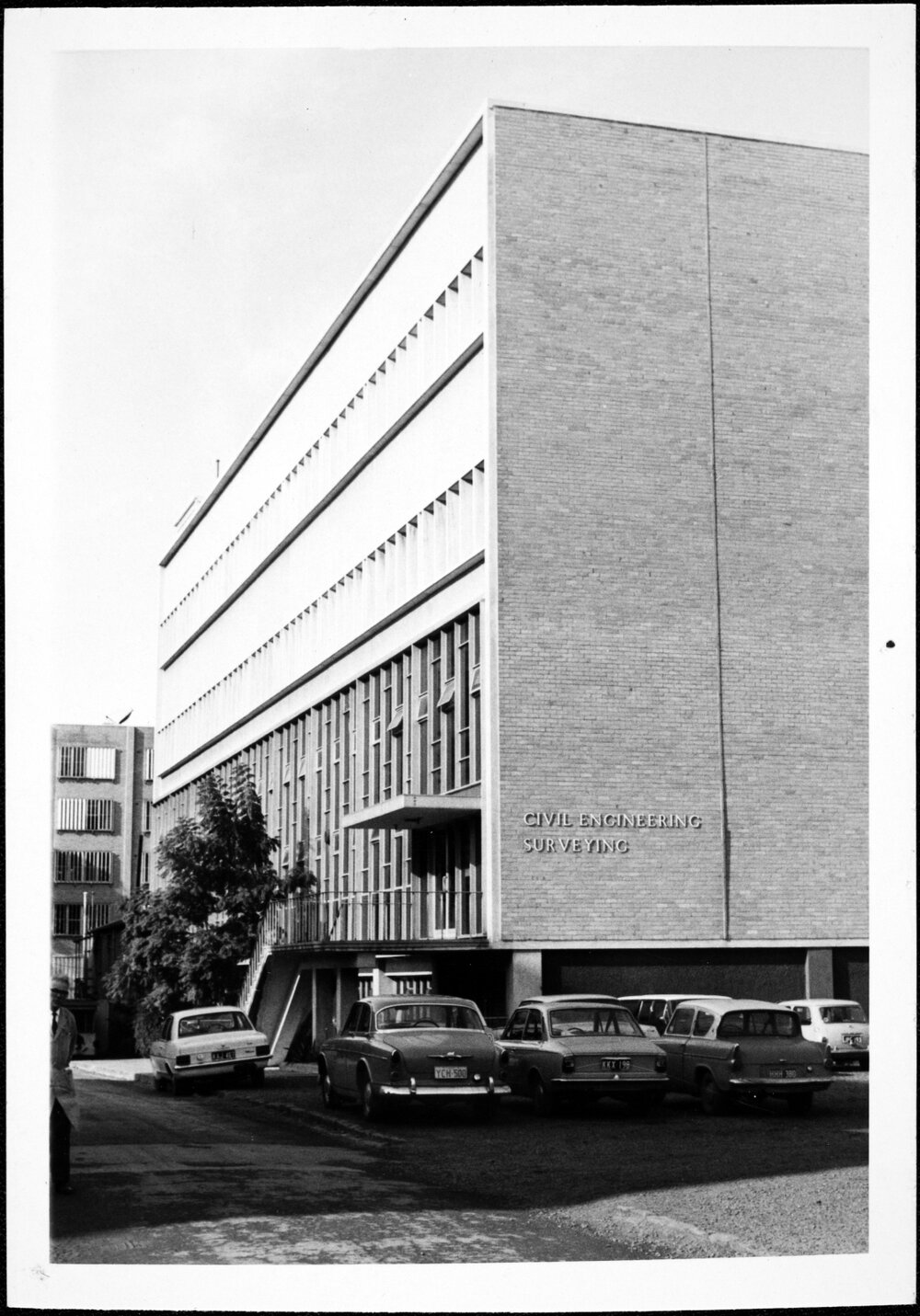 Civil Engineering and Surveying Building showing right concrete extension with stairway. Jul 1971