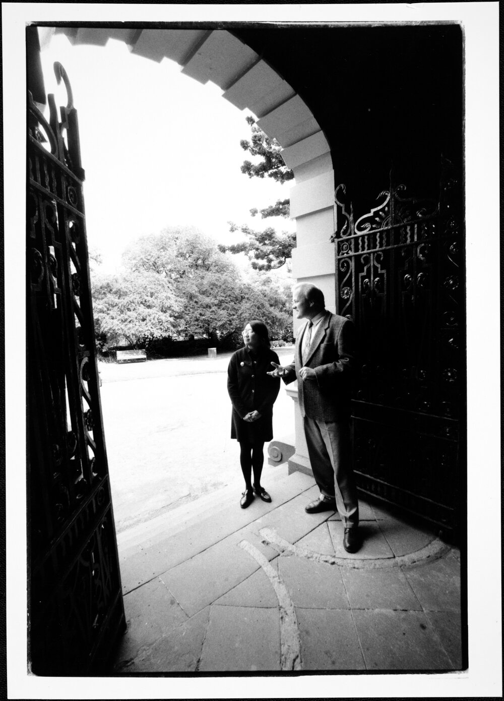 Chief Executive Officer of the University Postgraduate Association, Teresa Tjia and Acting Dean of the School of Graduate Studies, Professor Peter McPhee, in the entrance of the 1888 Building