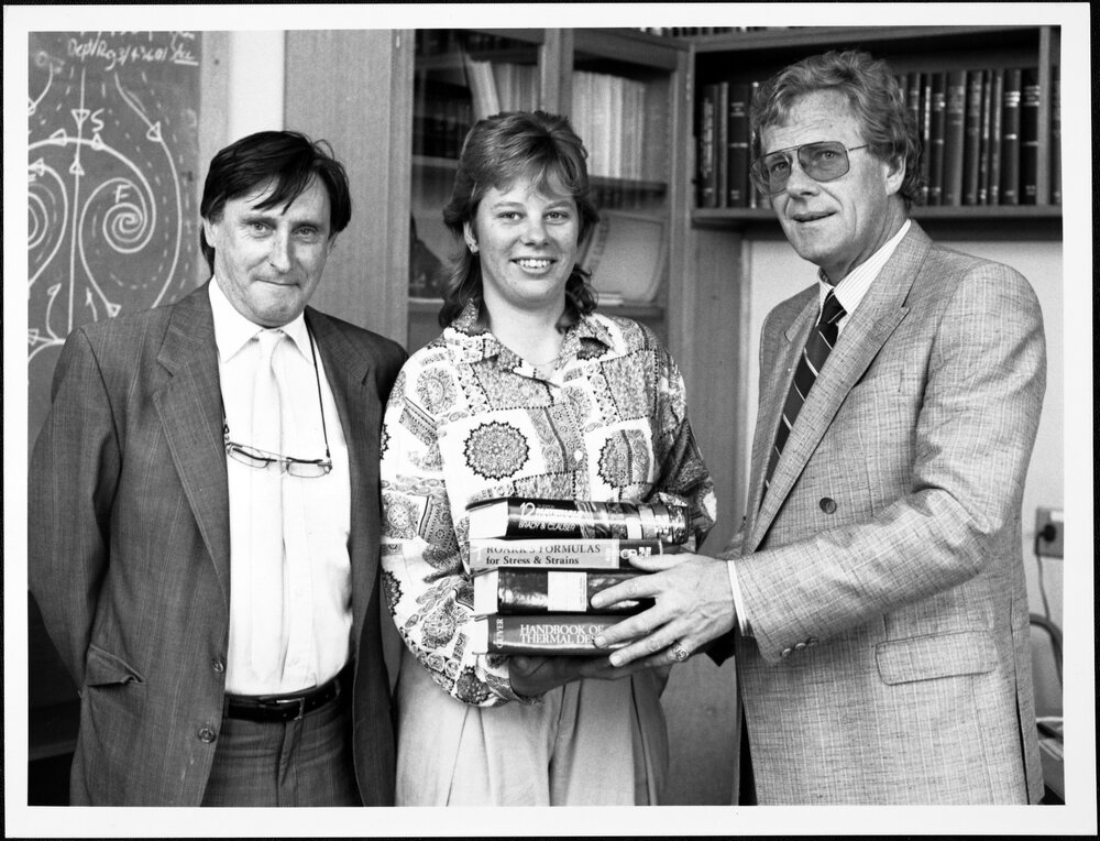 Andrew Vander Zwan, Manager, Public Affairs, Aerospace Technologies Australia Pty Ltd, presents the Aerospace Technologies of Australia Book Prize to Cheryl McGraw.