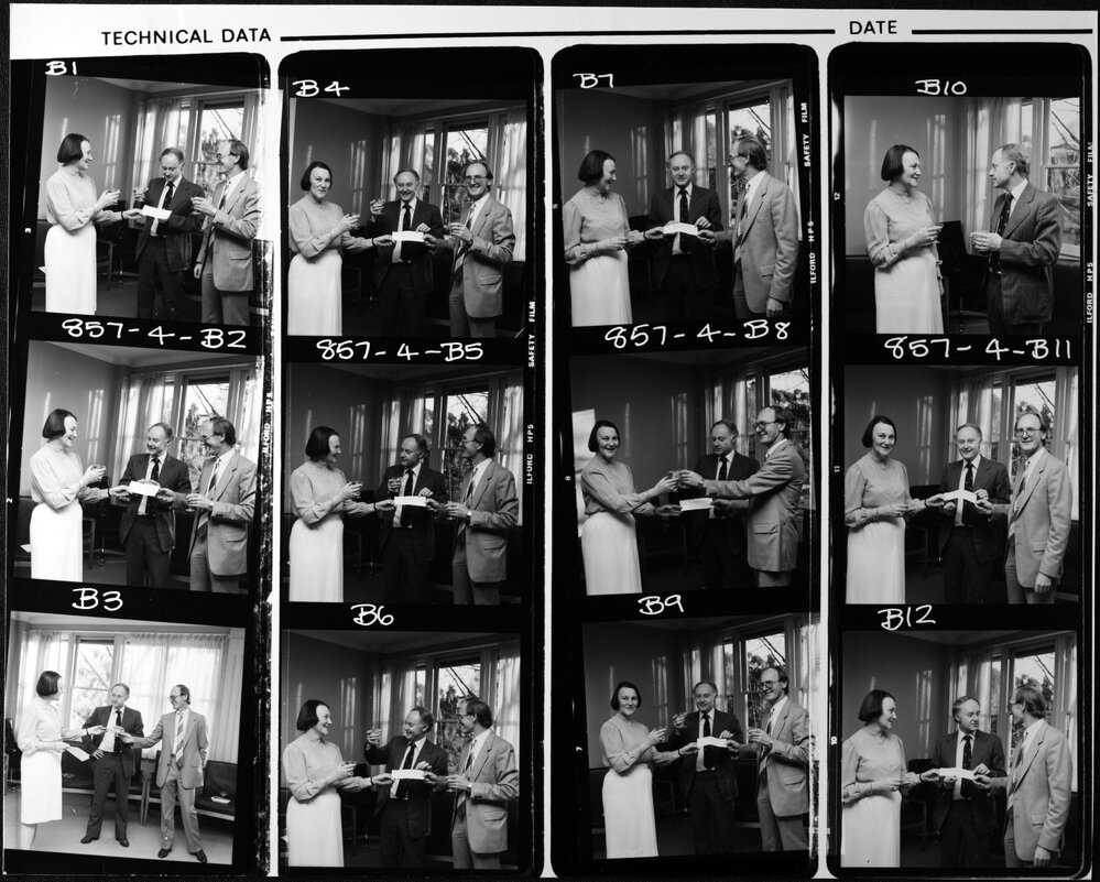 Graduate School of Management. Prof John Rickard (centre) and Professor Fitzroy of Monash, receive cheque for establishment of Management Education Foundation from the Federal Government