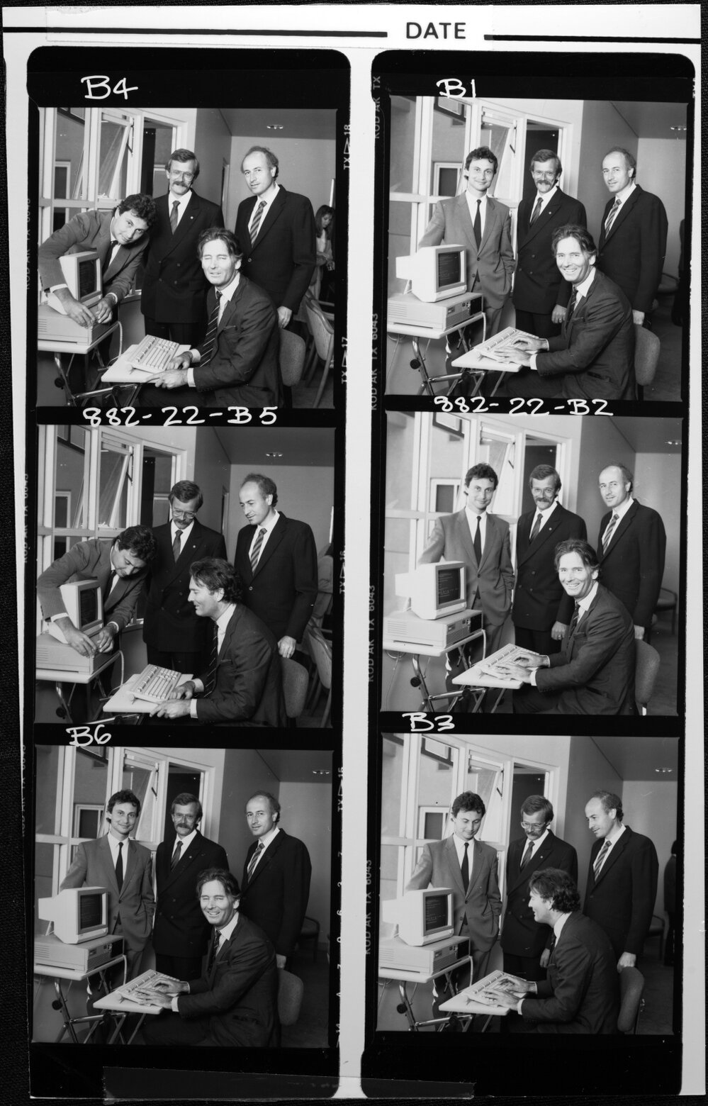 Graduate School of Management Director Professor John Rose at the keyboard of one of the Wang PC&rsquo;s watched by the donors, from left, Robert Poulton of Corrs Pavey Whiting and Byrne, and David Dettmer and Denis Robin of Wang Australia