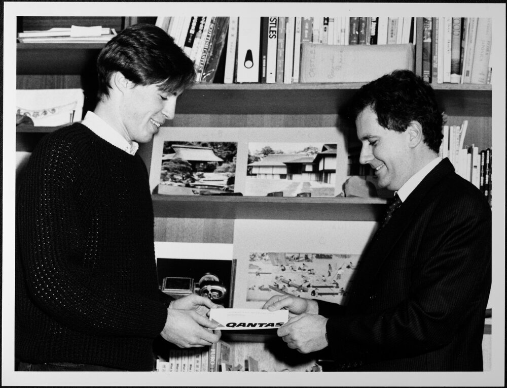 Scholarships. Professor William Coaldrake presents Sylvan Brown with his airline ticket as winner of the Intermediate Japanese...