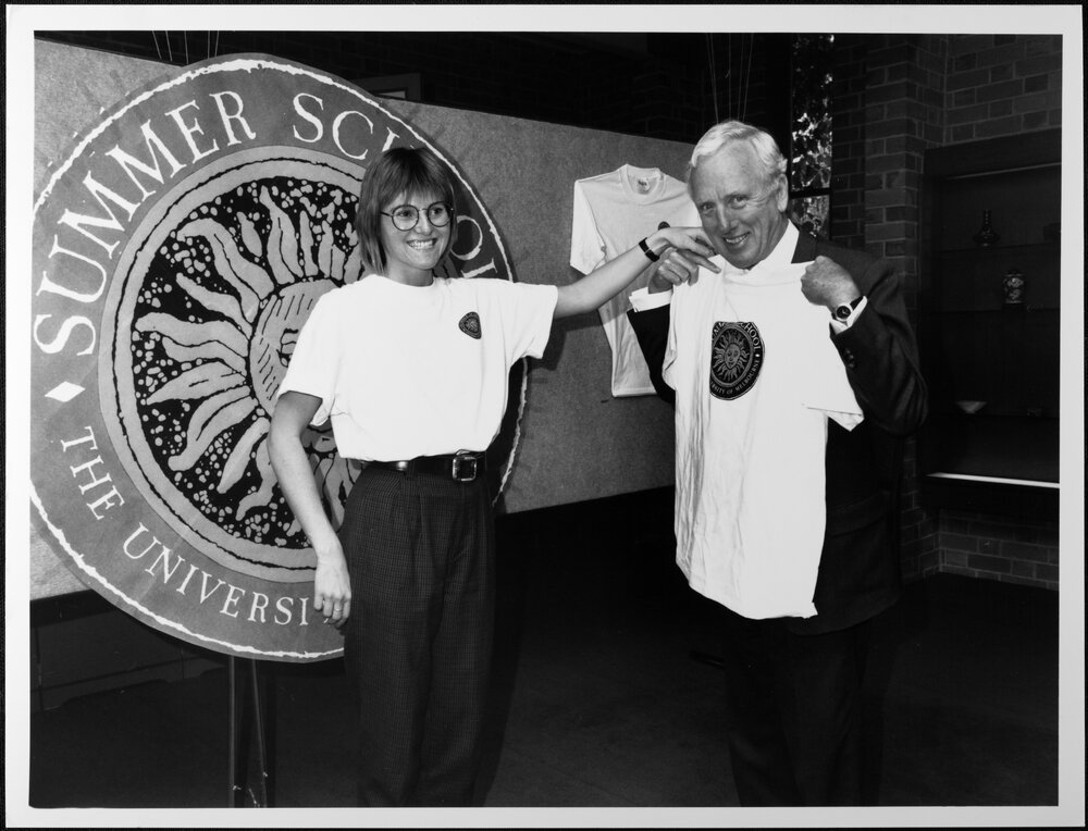 Summer School, Evelyn Walter and Vice-Chancellor David Penington with tee shirt. 1991