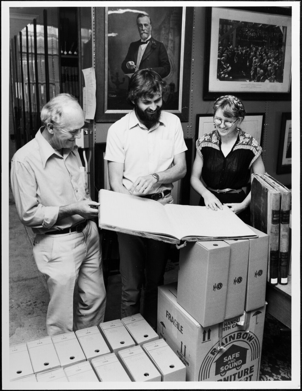 University Library Archives. Frank Strahan and others with CRA records